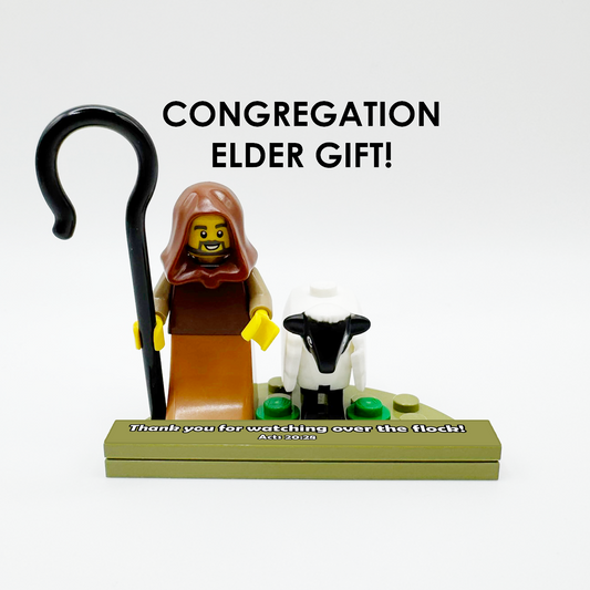 Brick figure of a shepherd with a lamb and a staff, labeled 'Congregation Elder Gift!'.