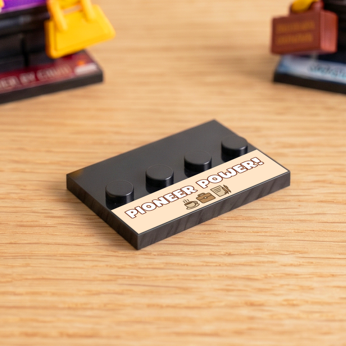 Black brick figure display stand with a 'Pioneer Power' decal